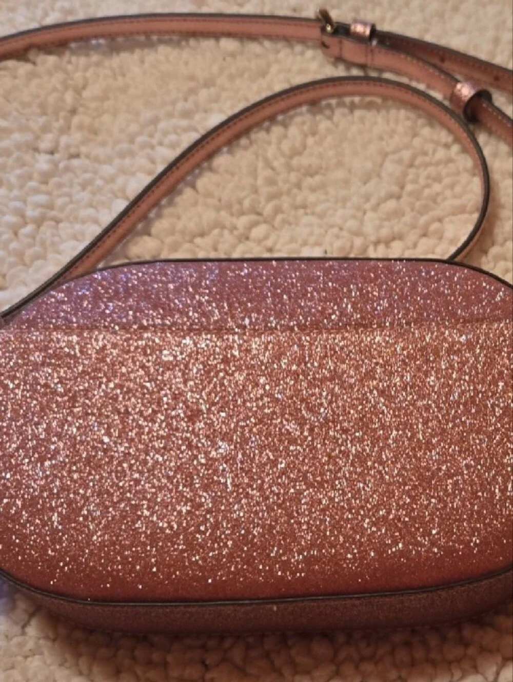kate spade Rose Gold Glitter Oval Crossbody Bag